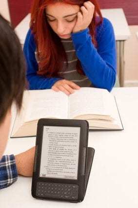 Students reading in two different formats