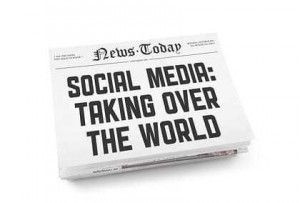 A stack of newspapers with headline "Social media: Taking over the world". Isolated on white.