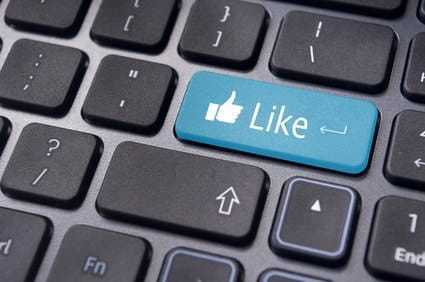 A like message on enter keyboard for social media concepts.