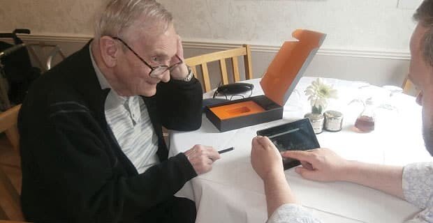 Older person with computer