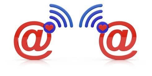 Internet love concept. Abstract e-mail symbols isolated on white background.