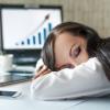 Switch off the Internet every day to preserve your brain Tired businesswoman at overtime at office
