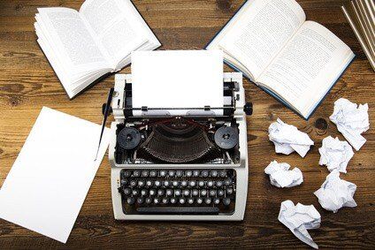 Vintage typewriter on old book