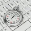 Is your business ready for being instant? Stopwatch on white computer keyboard