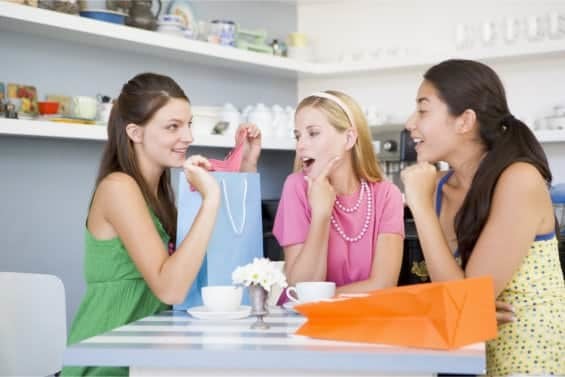 Women sharing shopping experience