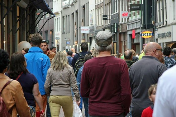 Psychographic segmentation. Everyone in this shopping street scene wants something different.