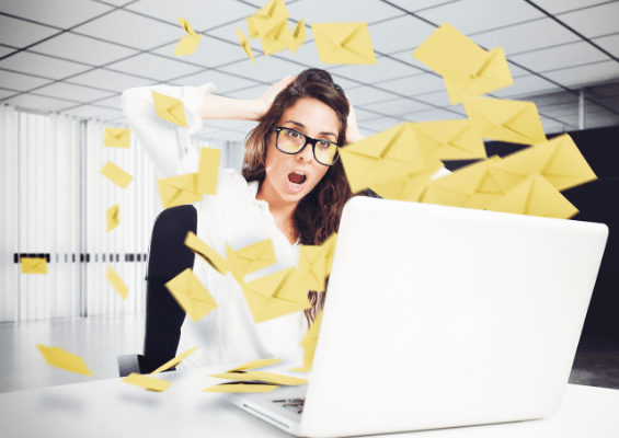 Woman surrounded by emails