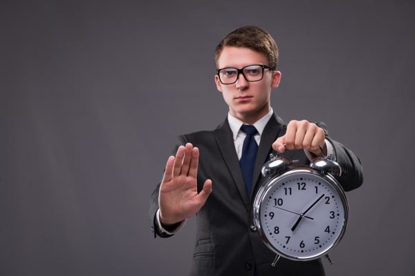 Man signalling a time pause